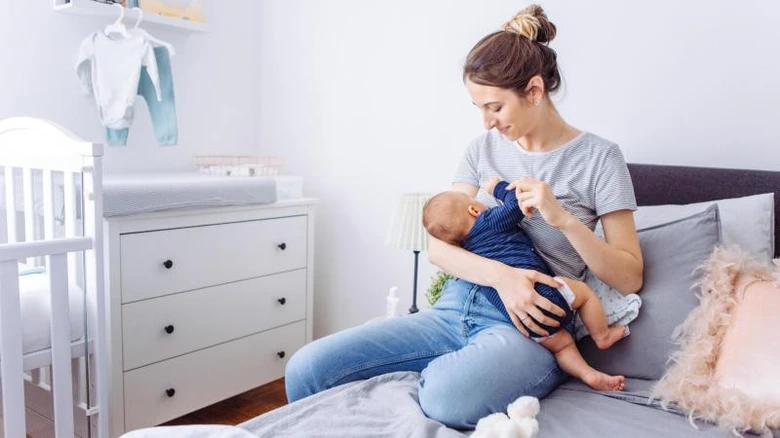 Mother breastfeeding baby