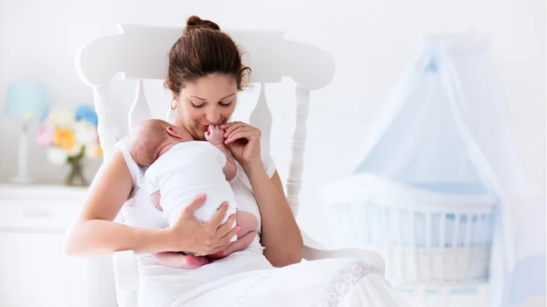 Mother breastfeeding baby