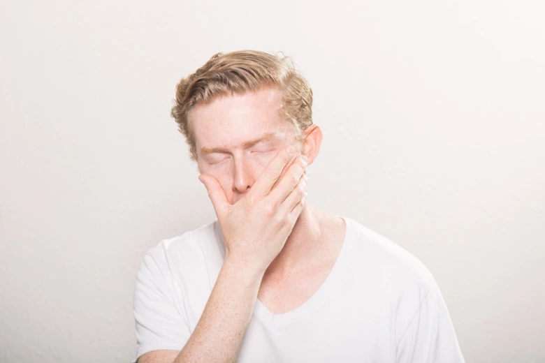 Man feeling nauseous
