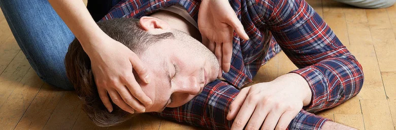 Man unconscious on floor