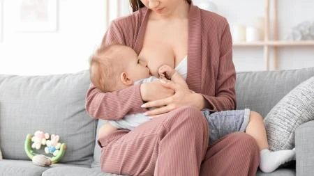 Mother breastfeeding baby